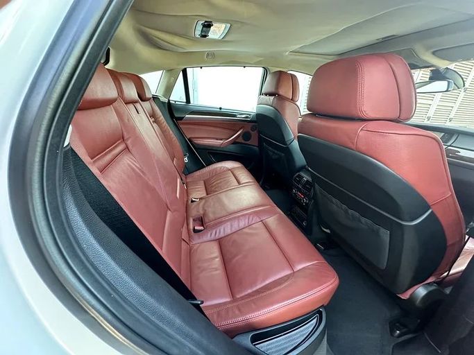 Подержанный BMW X6 35i I (E71) Рестайлинг, 3.0 л, 2014 в Дубае от Formula Motors Белый цвет. GCC | AUTO.AE