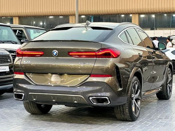 Подержанный BMW X6 40i III (G06), 3.0 л, 2021 в Дубае от Auto Bank Motors Черный цвет. Корейская | AUTO.AE