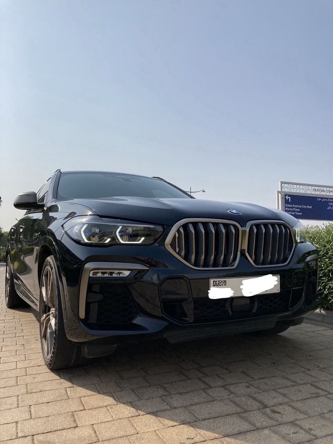مستعملة BMW X6 M50i III (G06), 4.4 l, 2022 في في دبي، اللون أسود. مواصفات الخليج | AUTO.AE