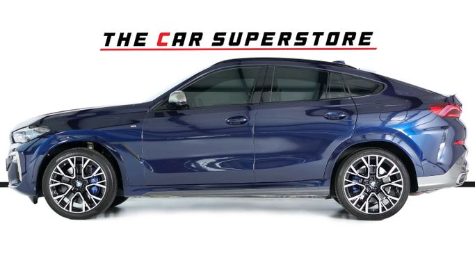 Подержанный BMW X6 M50i III (G06), 4.4 л, 2022 в Дубае от The Car Superstore Синий цвет. GCC | AUTO.AE
