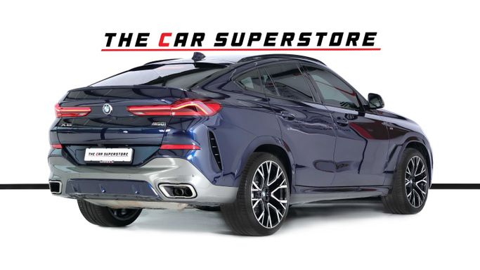 Подержанный BMW X6 M50i III (G06), 4.4 л, 2022 в Дубае от The Car Superstore Синий цвет. GCC | AUTO.AE
