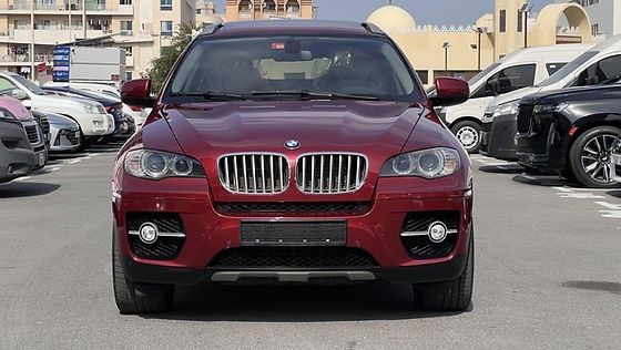 Подержанный BMW X6 50i xDrive I (E71), 4.4 л, 2009 в Дубае от DEVA CARS Красный цвет. GCC | AUTO.AE
