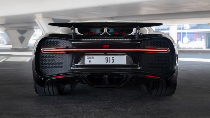 Bugatti Chiron, 2021 sport coupe for rent in Dubai by AVA car rental, black color | AUTO.AE