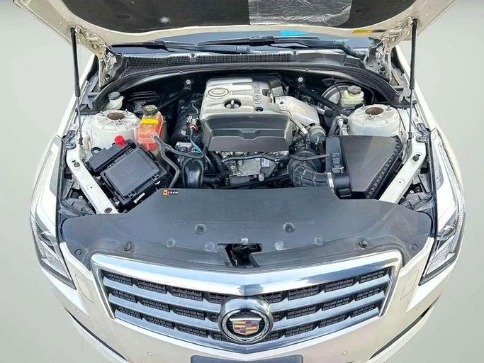 Подержанный Cadillac ATS I Рестайлинг, 2.0 л, 2014 в Дубае от Mirza Automobile FZE Белый цвет. Японская | AUTO.AE