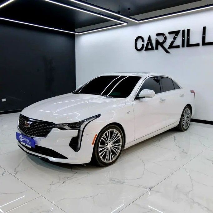 Used Cadillac CT4 I, 2.0 l, 2020 in Dubai by Carzilla Motors, White color. GCC Specs | AUTO.AE