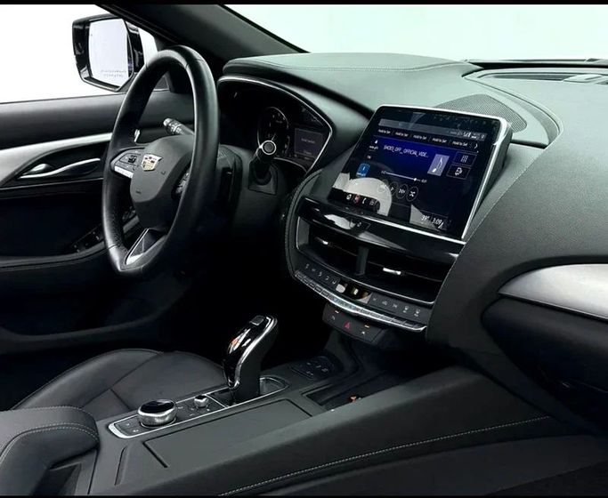 Used Cadillac CT5 I, 2.0 l, 2023 in Dubai by Formula Motors, White color. GCC Specs | AUTO.AE