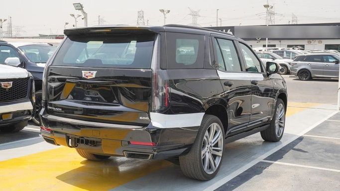 Новый Cadillac Escalade 600 V Рестайлинг, 6.2 л, 2025 в Дубае от Najem Motors Черный цвет. GCC | AUTO.AE