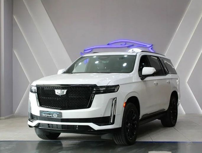 Подержанный Cadillac Escalade V, 6.2 л, 2024 в Дубае от Hot Wheel Used Motors Белый цвет. Other | AUTO.AE