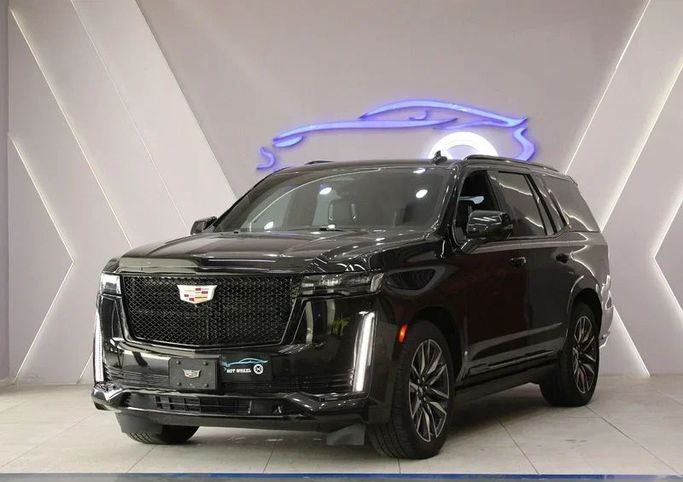 Подержанный Cadillac Escalade V, 6.2 л, 2023 в Дубае от Hot Wheel Used Motors Черный цвет. Other | AUTO.AE