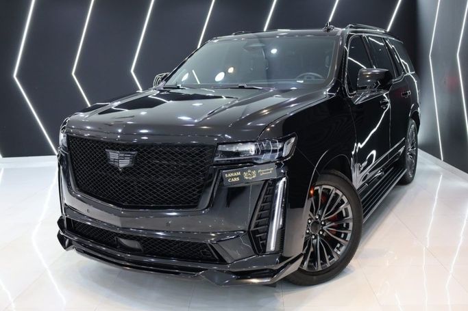 Used Cadillac Escalade V, 6.2 l, 2023 in Dubai by Sanam Cars, Black color. GCC Specs | AUTO.AE