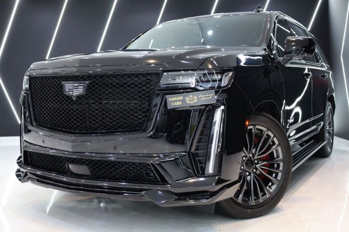 Used Cadillac Escalade V, 6.2 l, 2023 in Dubai by Sanam Cars, Black color. GCC Specs | AUTO.AE