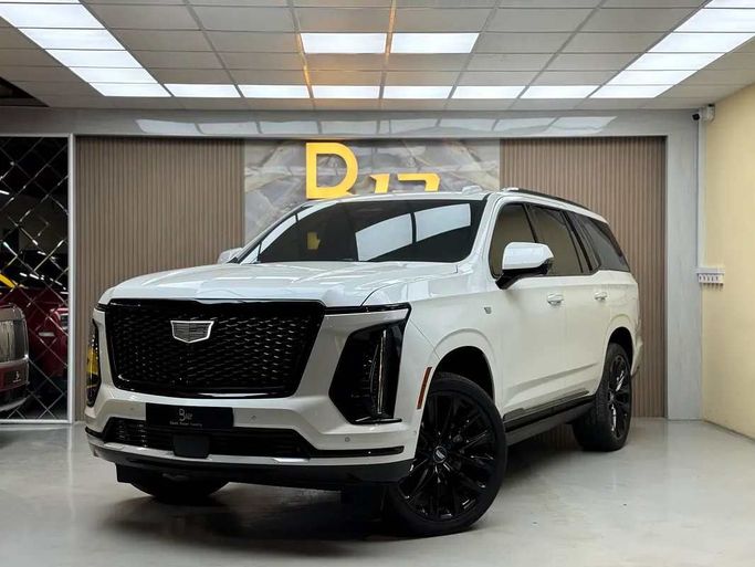 Подержанный Cadillac Escalade 600 V Рестайлинг, 6.2 л, 2025 в Дубае от B12 Motors Белый цвет. Американская | AUTO.AE