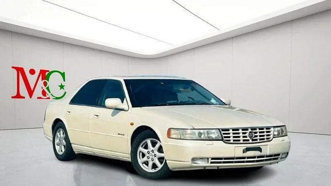 Подержанный Cadillac Seville V, 4.6 л, 2001 в Дубае от Mirza Automobile FZE Белый цвет. Японская | AUTO.AE