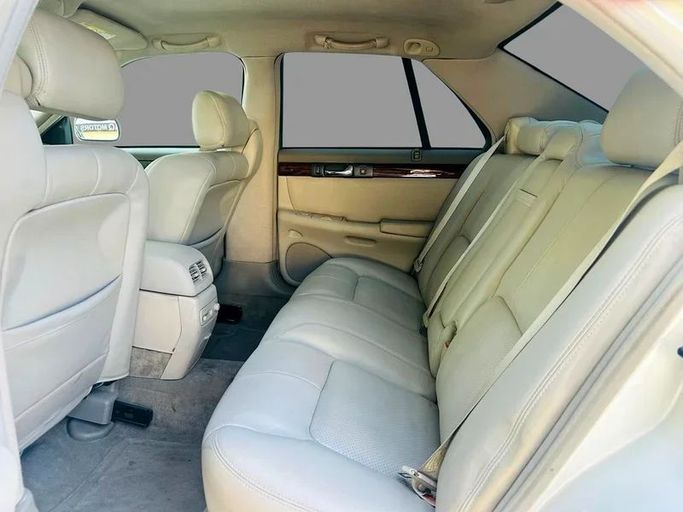 Подержанный Cadillac Seville V, 4.6 л, 2001 в Дубае от Mirza Automobile FZE Белый цвет. Японская | AUTO.AE