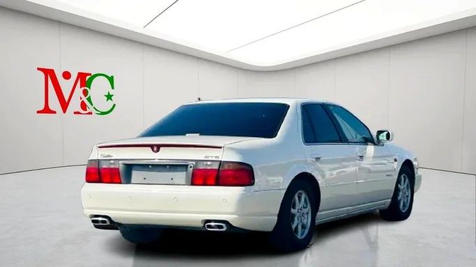 Подержанный Cadillac Seville V, 4.6 л, 2001 в Дубае от Mirza Automobile FZE Белый цвет. Японская | AUTO.AE