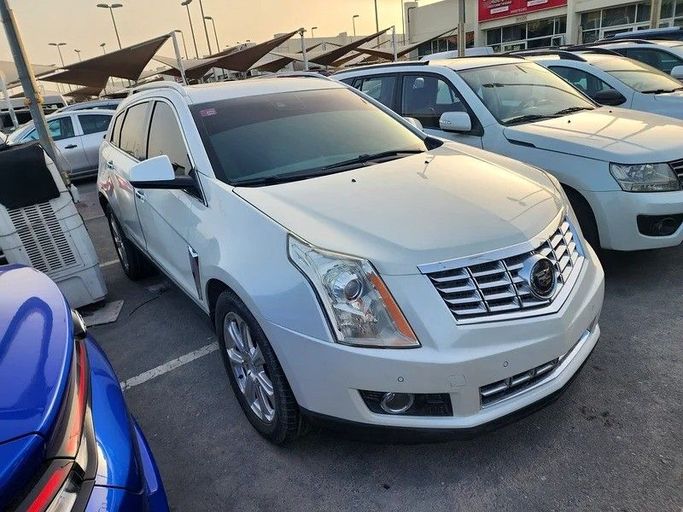 Подержанный Cadillac SRX II Рестайлинг, 3.6 л, 2014 в Дубае от Abdo Al Muthanna Used Cars Белый цвет. GCC | AUTO.AE