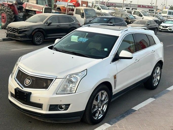 مستعملة Cadillac SRX شد الوجه الثاني, 3.0 l, 2012 في في دبي من HAROON SHARIF MOTORS، اللون أبيض. المواصفات اليابانية | AUTO.AE