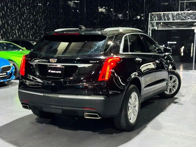 Used Cadillac XT5 I Facelift, 2.0 l, 2022 in Dubai by Zeus Motors, Black color. GCC Specs | AUTO.AE