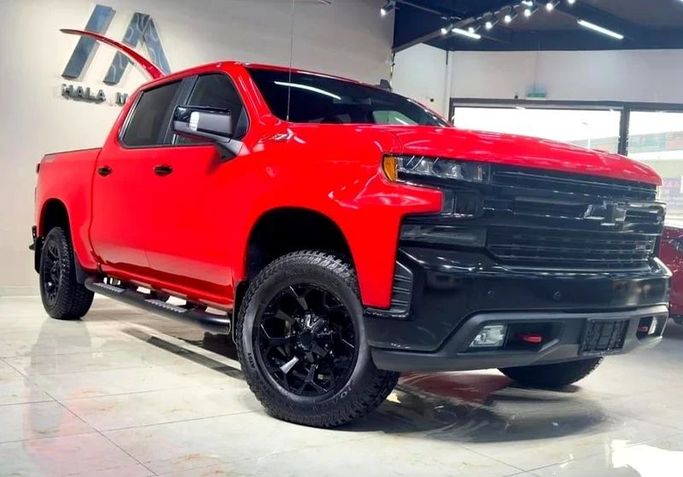 Подержанный Chevrolet Silverado IV (T1XX), 5.3 л, 2021 в Дубае от Hot Wheel Used Motors Красный цвет. Other | AUTO.AE