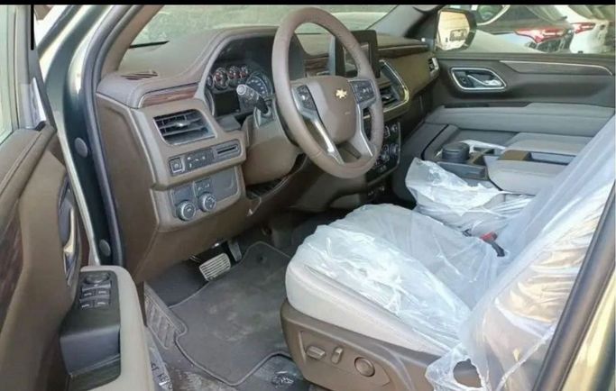 New Chevrolet Tahoe V, 5.3 l, 2023 in Dubai by Mohamed Hakim Motors, Silver color. GCC Specs | AUTO.AE