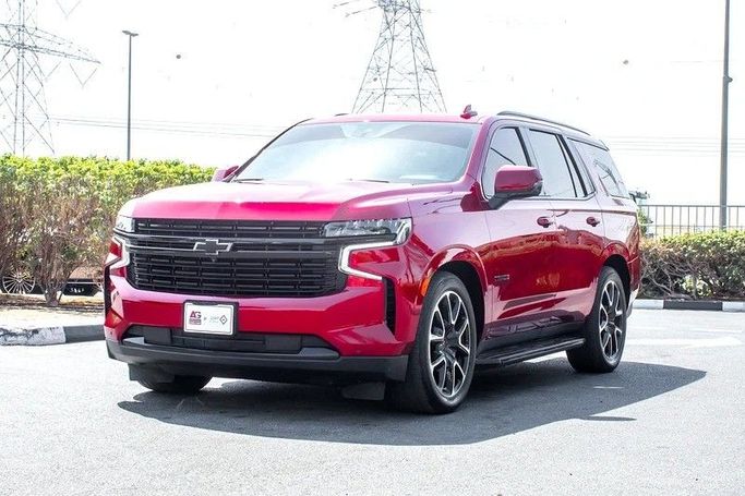 Подержанный Chevrolet Tahoe V, 6.2 л, 2023 в Дубае от AG Motors Красный цвет. GCC | AUTO.AE