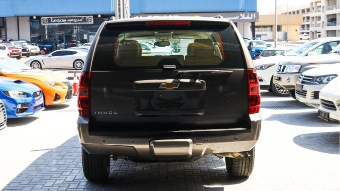 Подержанный Chevrolet Tahoe IV, 6.2 л, 2014 в Дубае от Al Falasi Motors Серый цвет. Other | AUTO.AE