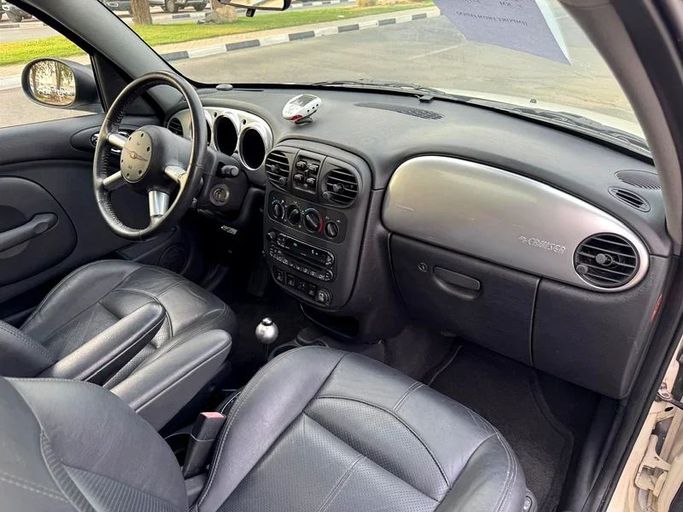 Подержанный Chrysler PT Cruiser, 2.4 л, 2005 в Дубае от Mirza Automobile FZE Белый цвет. Японская | AUTO.AE