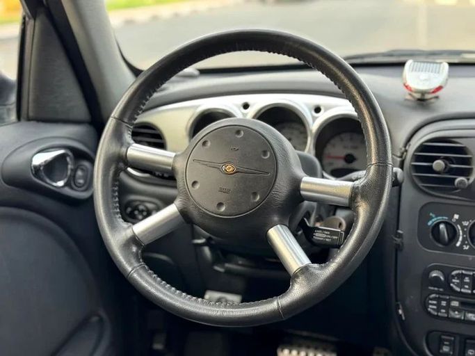 Подержанный Chrysler PT Cruiser, 2.4 л, 2005 в Дубае от Mirza Automobile FZE Белый цвет. Японская | AUTO.AE