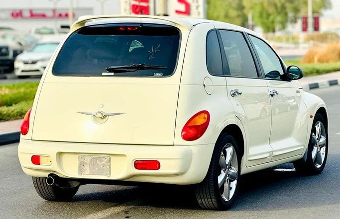 Подержанный Chrysler PT Cruiser, 2.4 л, 2005 в Дубае от Mirza Automobile FZE Белый цвет. Японская | AUTO.AE