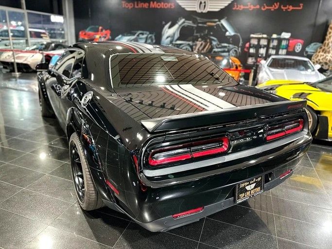 Подержанный Dodge Challenger SRT III Рестайлинг 2, 6.4 л, 2023 в Дубае от Top Line Motors Черный цвет. GCC | AUTO.AE