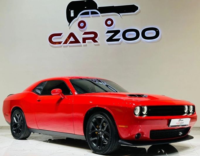 Подержанный Dodge Challenger GT III Рестайлинг 2, 3.6 л, 2022 в Дубае от Carzoo Used Cars Trading Красный цвет. Американская | AUTO.AE