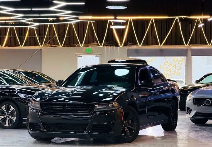 Подержанный Dodge Charger SXT VII (LD) Рестайлинг, 3.6 л, 2021 в Дубае от Morya Jeswani Cars Черный цвет. Американская | AUTO.AE