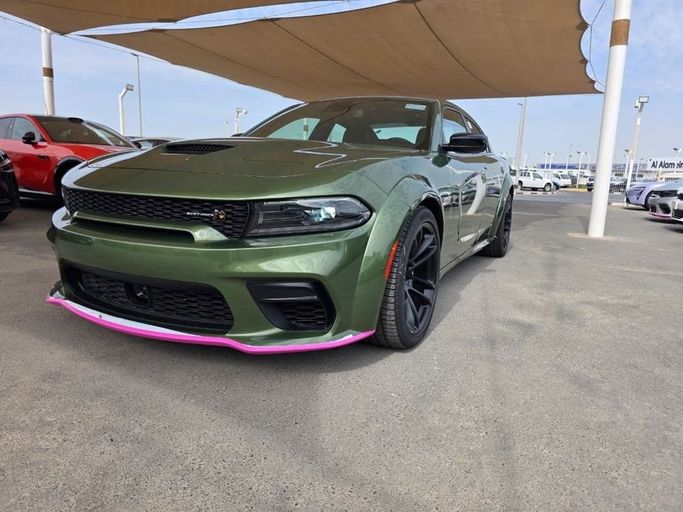 Новый Dodge Charger SRT VII (LD) Рестайлинг, 6.4 л, 2023 в Дубае от AL BAHIYA INTERNATIONAL MOTORS FZE Зеленый цвет. Американская | AUTO.AE