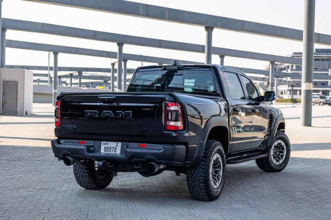 Dodge RAM IV (DS/DJ), 2022 sport pickup double cab crew cab for rent in Dubai by POF RENTAL, black color | AUTO.AE