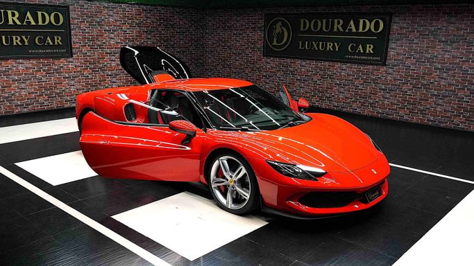 Подержанный Ferrari 296 GTB, 3.0 л, 2023 в Дубае от Dourado Luxury Car Красный цвет. GCC | AUTO.AE