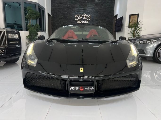 Used Ferrari 488 Spider, 3.9 l, 2018 in Dubai by Quatro Motors, Black color. GCC Specs | AUTO.AE