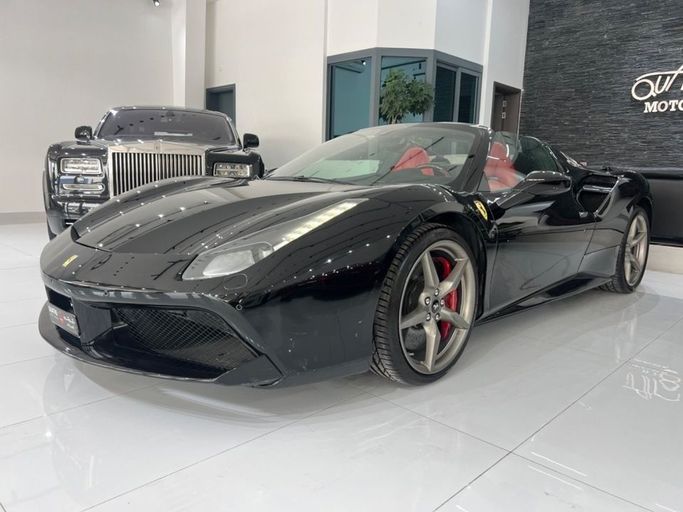 Used Ferrari 488 Spider, 3.9 l, 2018 in Dubai by Quatro Motors, Black color. GCC Specs | AUTO.AE