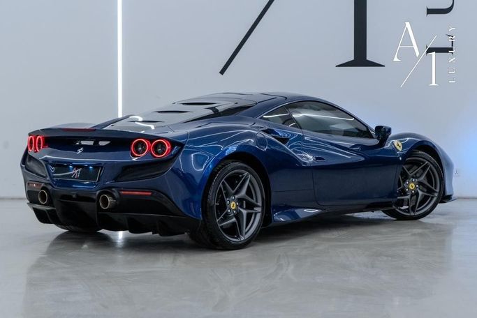 Подержанный Ferrari F8 Tributo, 3.9 л, 2022 в Дубае от A1 Luxury Motors Синий цвет. GCC | AUTO.AE