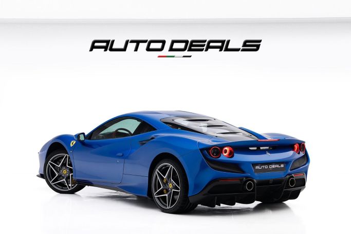 Подержанный Ferrari F8 Tributo, 3.9 л, 2020 в Дубае от AUTO DEALS Синий цвет. GCC | AUTO.AE