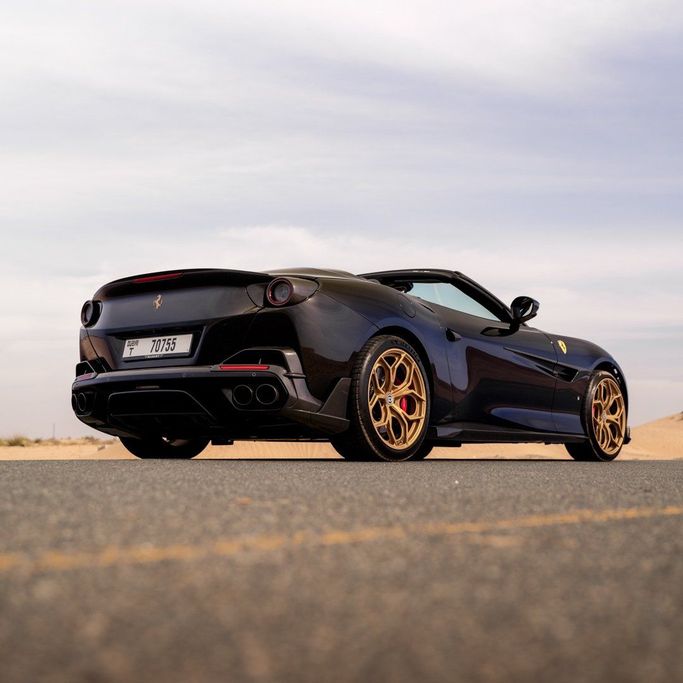 Ferrari Portofino I Facelift (M), 2023 sport cabriolet for rent in Dubai by DEIZ, black color | AUTO.AE