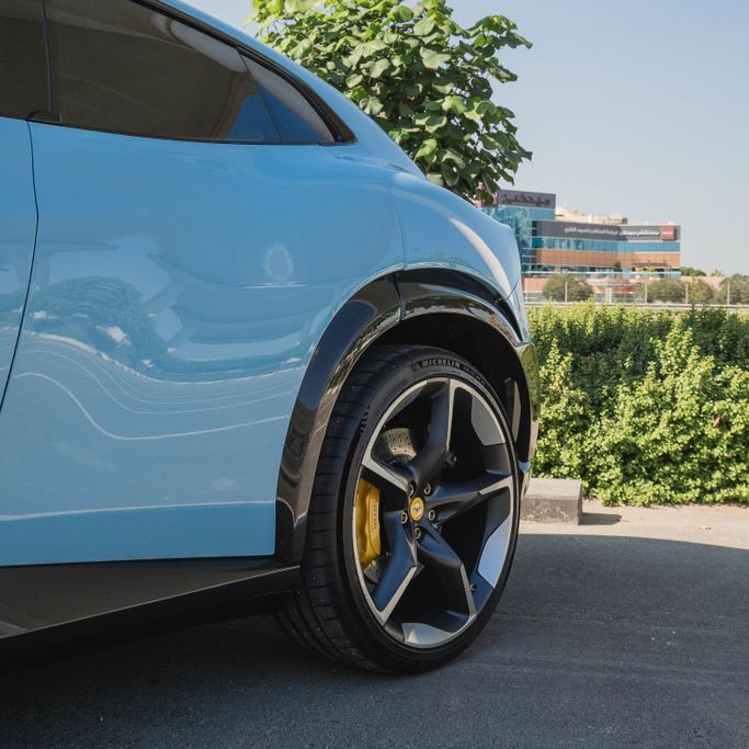 Ferrari Purosangue, 2024 sport suv 5 dr. for rent in Dubai by DEIZ, light blue color | AUTO.AE