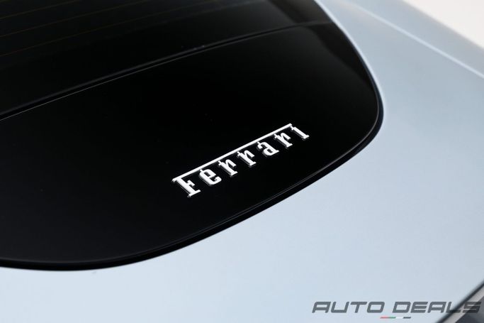 Подержанный Ferrari Roma, 3.9 л, 2022 в Дубае от AUTO DEALS Синий цвет. GCC | AUTO.AE