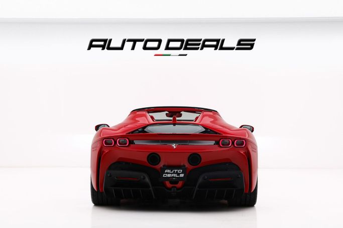 Подержанный Ferrari SF90 Stradale Spider I, 4.0 л, 2023 в Дубае от AUTO DEALS Красный цвет. GCC | AUTO.AE