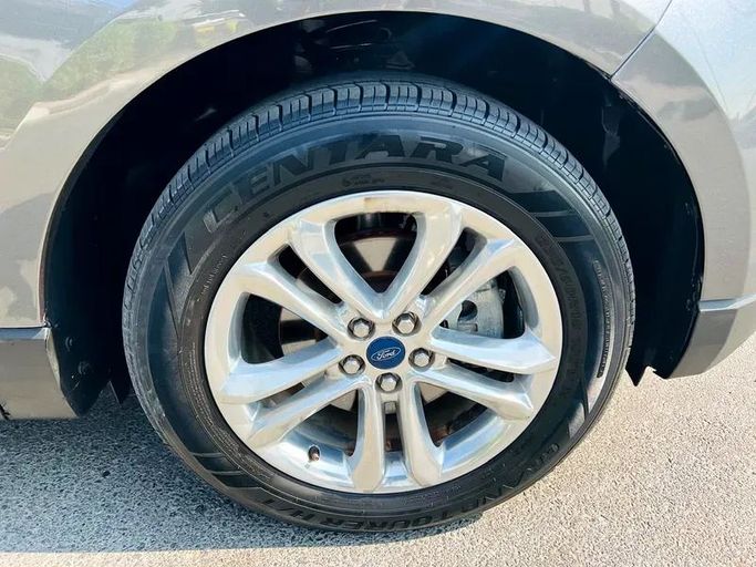 Used Ford Edge II Facelift, 2.0 l, 2022 in Dubai by First Choice Motors, Grey color. American Specs | AUTO.AE