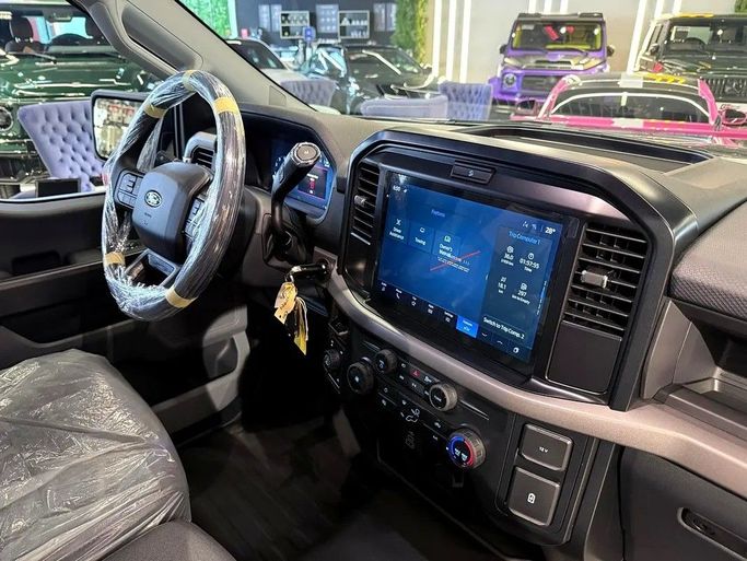 New Ford F-150 XIV Facelift, 5.0 l, 2025 in Dubai by GE Motors, Grey color. GCC Specs | AUTO.AE