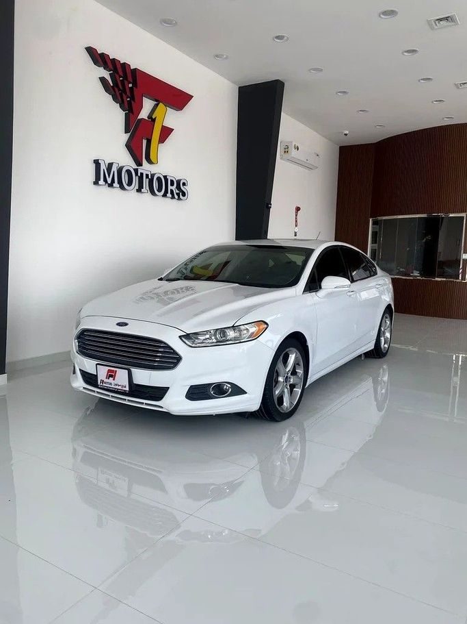 Used Ford Fusion (North America) II, 2.0 l, 2016 in Dubai by F1 Motors, White color. GCC Specs | AUTO.AE