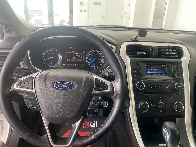 Used Ford Fusion (North America) II, 2.0 l, 2016 in Dubai by F1 Motors, White color. GCC Specs | AUTO.AE