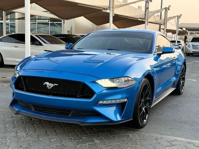 Подержанный Ford Mustang VI Рестайлинг, 2.3 л, 2019 в Дубае от Al Qemah Used Cars Синий цвет. Американская | AUTO.AE