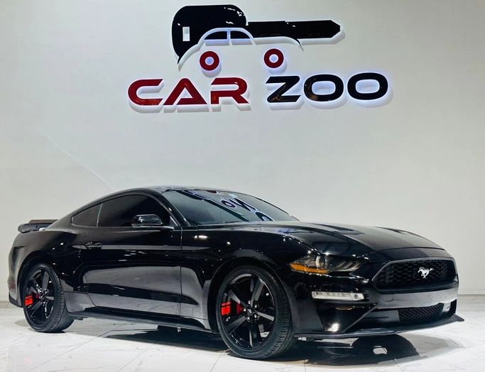 Подержанный Ford Mustang VI Рестайлинг, 2.3 л, 2021 в Дубае от Carzoo Used Cars Trading Черный цвет. Американская | AUTO.AE