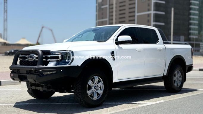 Подержанный Ford Ranger T6.2, 2.0 л, 2024 в Дубае от Alhamd Motors Белый цвет. Other | AUTO.AE